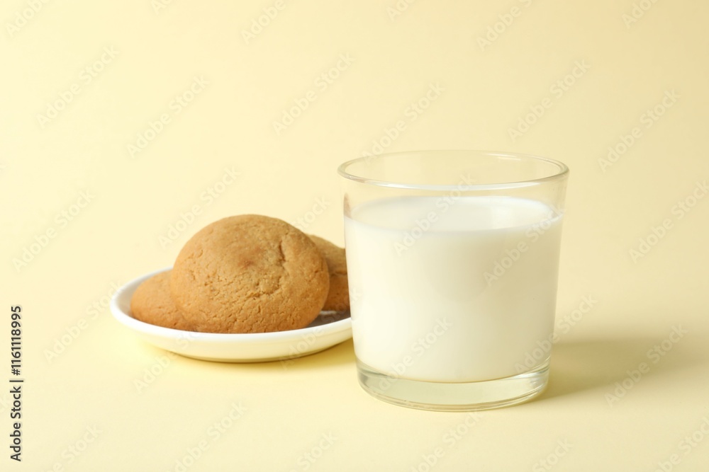 Glass of milk with cokies on color background Glass of milk with cokies on color background