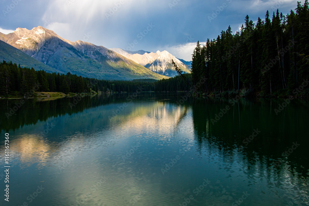Johnson Lake - nestled between Mount Rundle and Cascade Mountain Johnson Lake - nestled between Mount Rundle and Cascade Mountain
