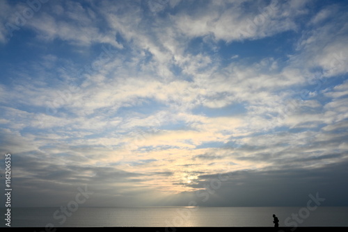 jogger running along the coast