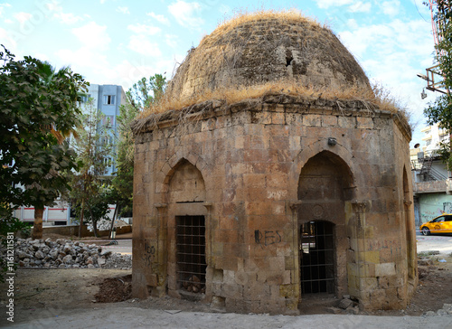 Located in Kiziltepe, Mardin, Turkey, the Sahlulubey Tomb was built in the 12th century during the Artuqid period. photo