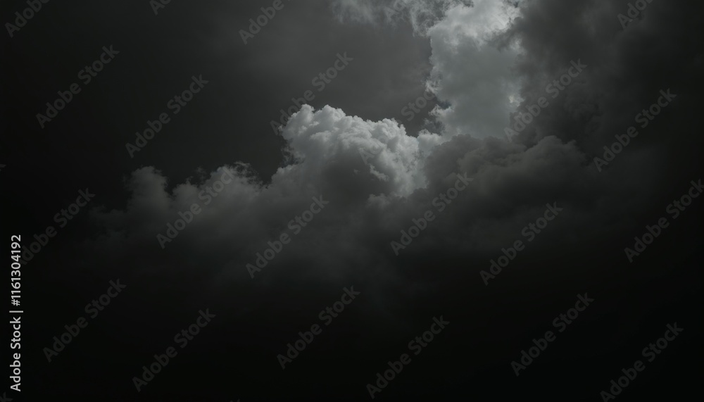 Dramatic storm clouds with a faint light breaking through for moody and atmospheric visual designs.