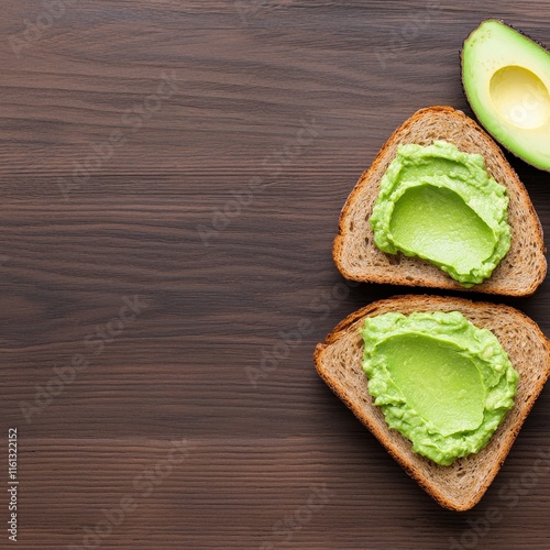 Deliciously Creamy Avocado Spread Generously Slathered on Freshly Baked Whole Grain Toast Creating a Healthy and Appetizing Breakfast Delight photo