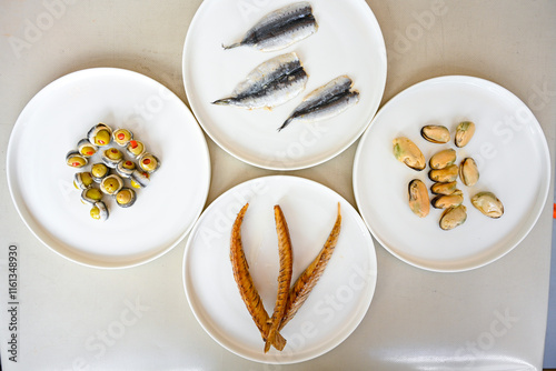 Fried Anchovies (Turkish Name: Hamsi Tava) .Hamsi, cinekop, kiraca, barbun,  mezgit,  istavrit, sardalya tava. Balik kizartma. Izgara cipura, levrek bugulama,   photo