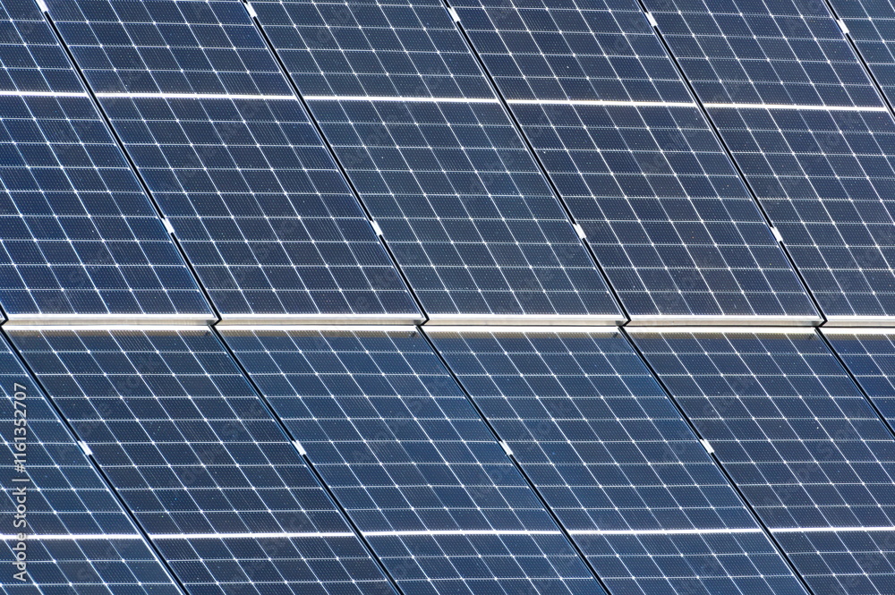 Roof covered by solar panels. Clean energy and green living concept. House in nature. Abstract technology background. Roof covered by solar panels. Clean energy and green living concept. House in nature. Abstract technology background.
