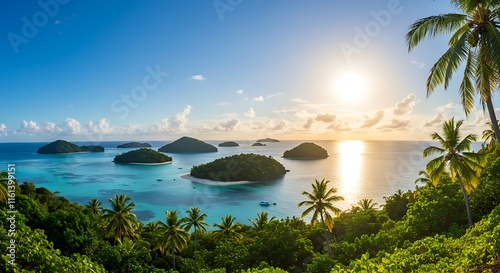 Sunrise over tropical islands.  Turquoise ocean, lush jungle, palm trees, beautiful beach.  Nature travel. photo