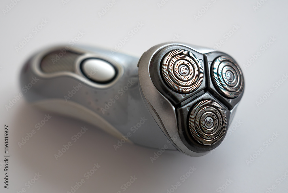Electric shaver with white isolate.Rotary electric shaver. Electric shaver with white isolate.Rotary electric shaver.