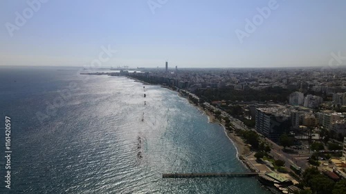 Wallpaper Mural Aerial view of the city on a clear day. Over Limassol, Cyprus. A majestic view of man's most beautiful urban creation. Aerial view of the modern cityscape with high-rise glass structures. Torontodigital.ca