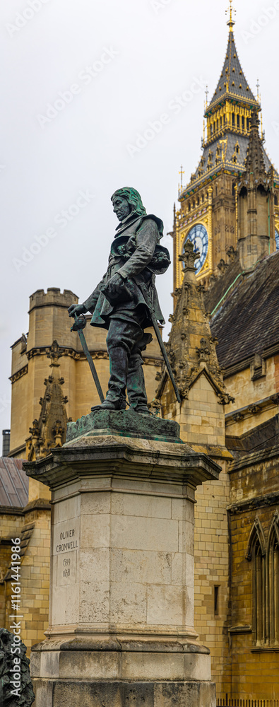 Oliver Cromwell statue in front of the Palace of Westminster, the meeting place of the Parliament of the United Kingdom located in London Oliver Cromwell statue in front of the Palace of Westminster, the meeting place of the Parliament of the United Kingdom located in London