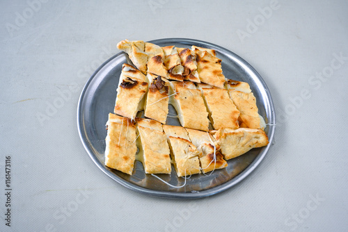 Kiymali pide. Turkish pide with minced meat. Turkish pizza mince pita Pide on white background. Etli ekmek. Kusbasi kasarli, kiymali kasarli, kiymali yumurtali, Bafra, Trabzon, Kusbasili pide. photo