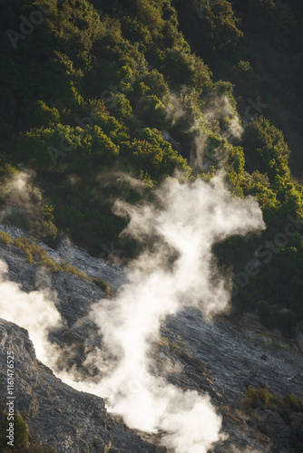 Steam vents in the volcanic terrain of the Phlegraean Fields near Pozzuoli, a geologically active Italian region. photo