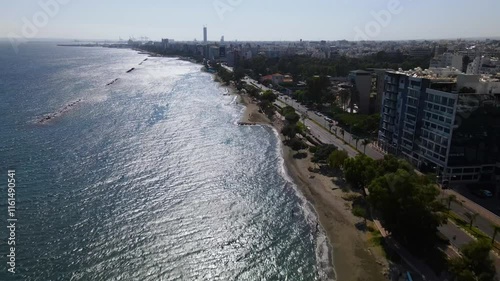 Wallpaper Mural Aerial view of the city on a clear day. Over Limassol, Cyprus. A majestic view of man's most beautiful urban creation. Aerial view of the modern cityscape with high-rise glass structures. Torontodigital.ca