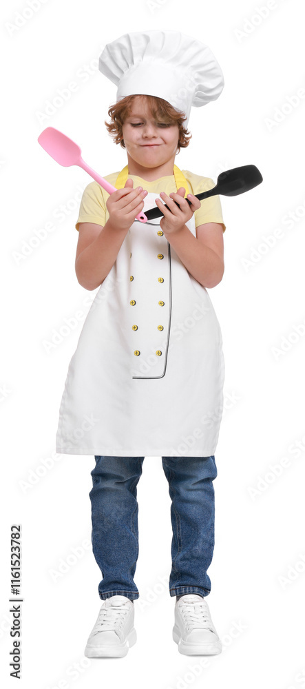 Little boy with utensils pretending to be chef on white background. Dreaming about future profession Little boy with utensils pretending to be chef on white background. Dreaming about future profession