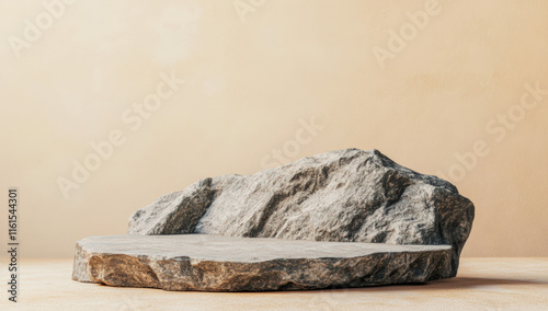 Minimalistic stone podium for product presentation, close-up, on a beige background, high-resolution photography.