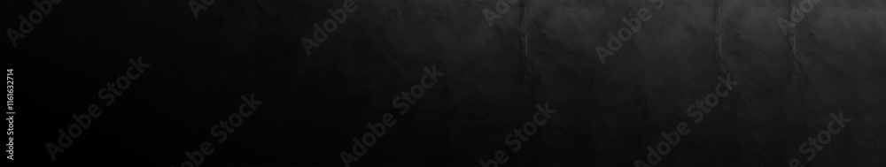 Naklejka premium Black textured background with subtle variations creating a moody atmosphere suitable for design projects