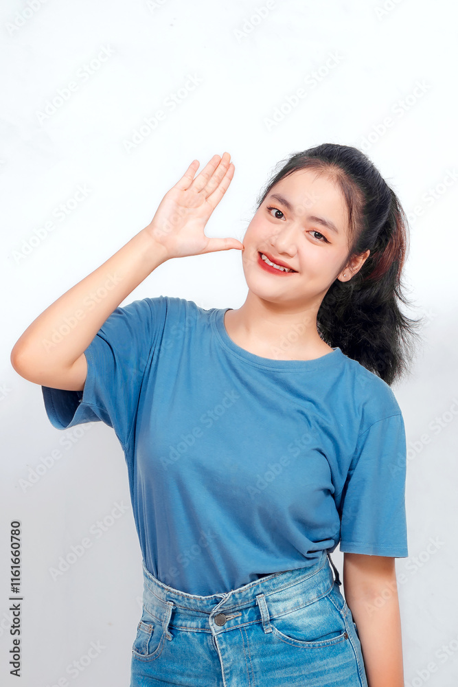 Excited Asian woman giving number 12345 by hand gesture Excited Asian woman giving number 12345 by hand gesture