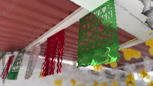 colorido papel picado correspondiente a las festividades de la virgen de guadalupe photo