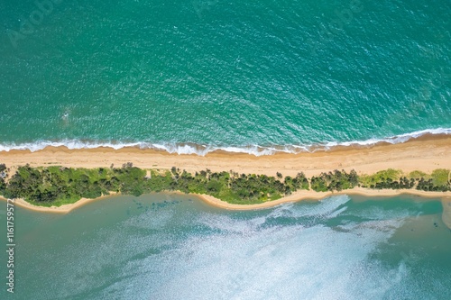 Breathtaking aerial view of Yudai Beach showcasing the pristine sands and turquoise waters in Boao, Qionghai, Hainan photo