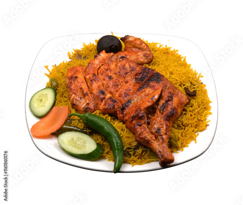 Alfahm grill fried chicken majboos rice in a white ceramic plate