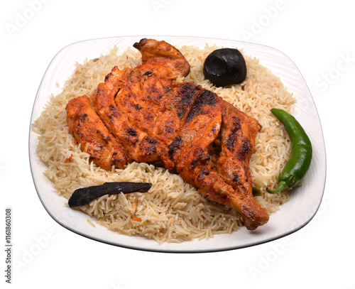 ALfahm fried chicken Mandi rice in a white ceramic plate