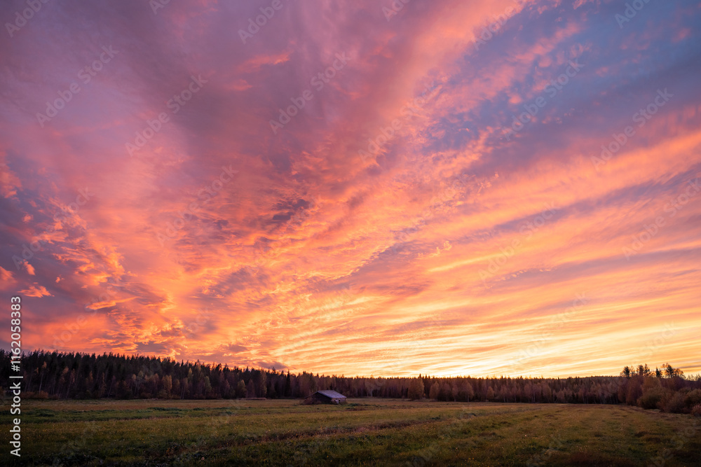 A dramatic sunset with amazing colors in the evening sky. Rovaniemi, Finland A dramatic sunset with amazing colors in the evening sky. Rovaniemi, Finland