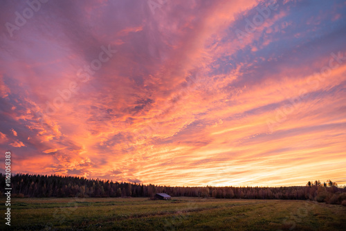 A dramatic sunset with amazing colors in the evening sky. Rovaniemi, Finland