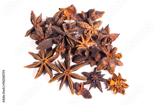 A bunch of dried up  star anise seeds are isolated on white background. Illicium verum (star anise) or badian is a medium-sized evergreen tree native to South China and northeast Vietnam. photo