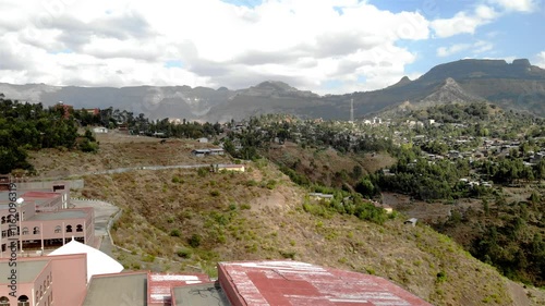 Aerial footage over Lalibela city, Ethiopia 
Drone view over Lalibela city Green hills, Ethiopia 
 photo