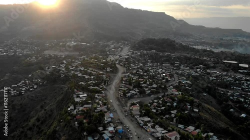 Lalibela city main road with houses and Mountain at Sunrise , Ethiopia, Aerial

Drone view over Lalibela city main road with houses and Mountain at Sunrise , Ethiopia
 photo