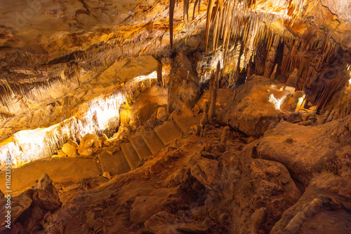 Stalactites and stalagmites forming in the caves of drach, mallorca, spain photo