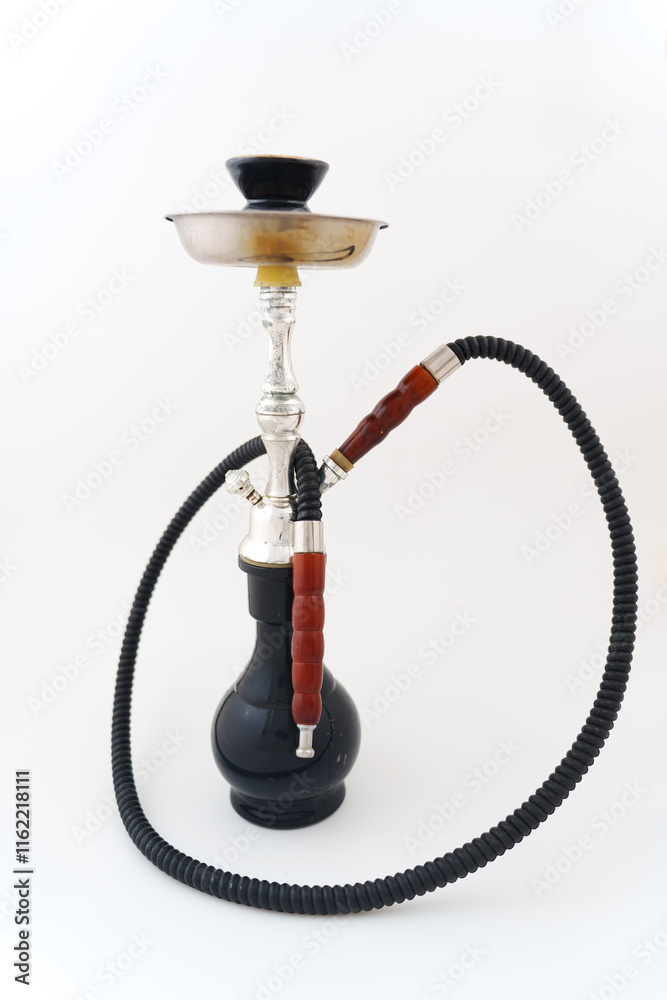 Hookah on a white background. smoking device for smoking a wet mixture of tobacco, glycerin, sugar molasses and flavorings. bad habit. Hookah on a white background. smoking device for smoking a wet mixture of tobacco, glycerin, sugar molasses and flavorings. bad habit.