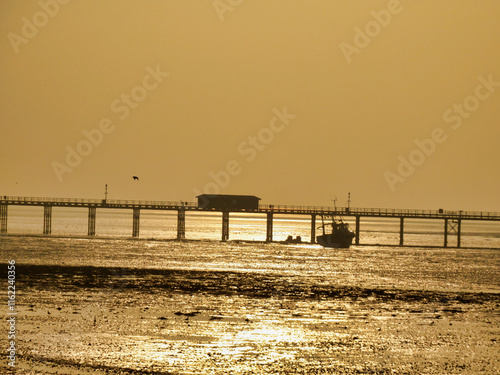 Sunset over Southend Pier in England
 photo