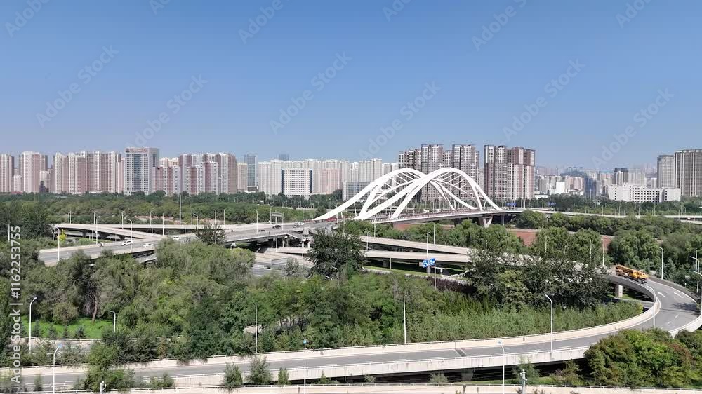 Stunning aerial view of Gansu Lanzhou Shen'an Yellow River Bridge showcasing urban landscape and engineering Stunning aerial view of Gansu Lanzhou Shen'an Yellow River Bridge showcasing urban landscape and engineering