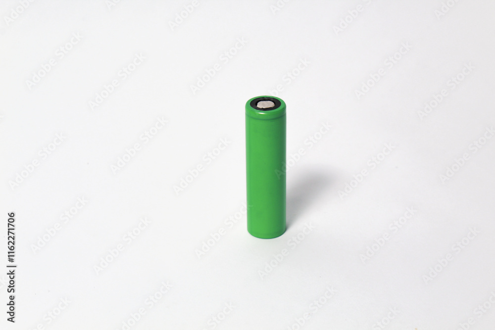 Rechargeable green 18650 Li Ion battery on isolated white background. Often used for electric cigarette, toys, or remote control. Rechargeable green 18650 Li Ion battery on isolated white background. Often used for electric cigarette, toys, or remote control.
