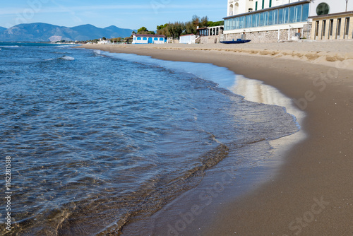 Fototapeta Naklejka Na Ścianę i Meble -  Sandy beach of medieval small touristic coastal town Sperlonga and sea shore, Latina, Italy