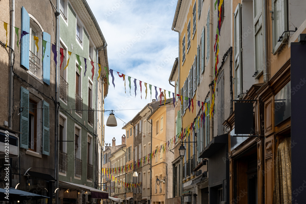 Streets and colourful houses of old part of Sisteron historical town in Alpes-de-Haute-Provence, France Streets and colourful houses of old part of Sisteron historical town in Alpes-de-Haute-Provence, France