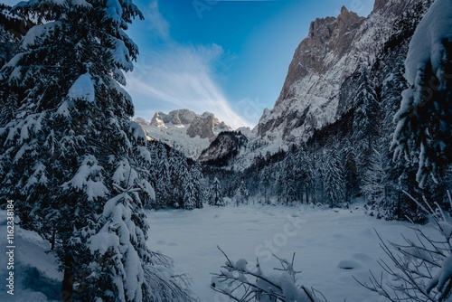 Mountain scenery in the Alps with Dachstein summit reflecting in Lake Gosausee, Salzkammergut, Austria in the Winter 