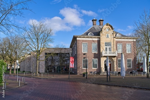 Former town hall of Gorssel with an empty terrace in front of it. photo