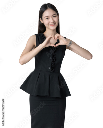 A young Asian woman in a black dress and silver bracelet forms a heart shape with her hands. on white background