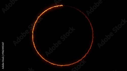 Rotating neon light circle of orange energy isolated on black background