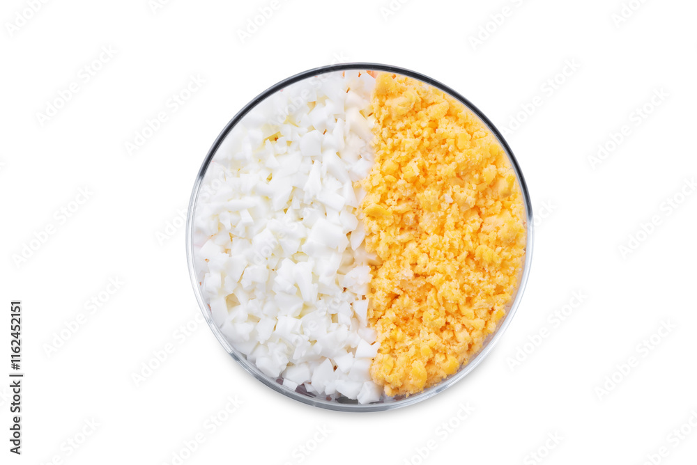 Herring layered salad with potatoes and eggs in a glass on a white isolated background Herring layered salad with potatoes and eggs in a glass on a white isolated background