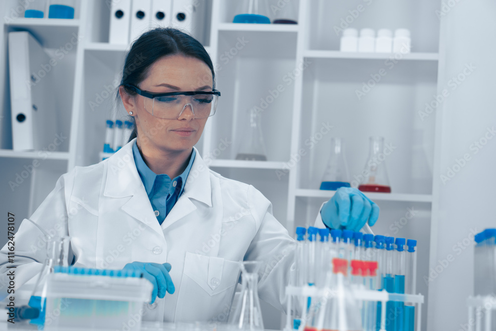 A dedicated scientist performs complex experiments in a modern lab, highlighting the importance of scientific exploration and the awe of discovery that motivates their research efforts A dedicated scientist performs complex experiments in a modern lab, highlighting the importance of scientific exploration and the awe of discovery that motivates their research efforts