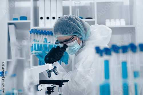 A dedicated Research Scientist is analyzing samples in a hightech lab, using advanced techniques and sophisticated equipment for extensive research across multiple scientific fields photo
