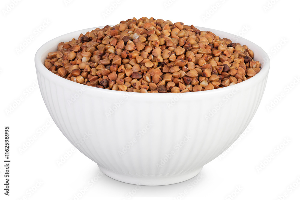 Raw buckwheat in ceramic bowl isolated on white background Raw buckwheat in ceramic bowl isolated on white background