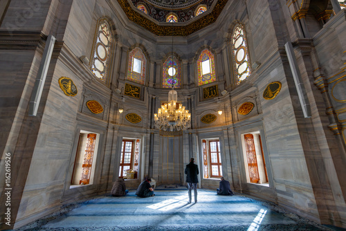 A beautiful view of the Nuruosmaniye Camii, the mosque near the Grand Bazaar in Istanbul, Turkey photo