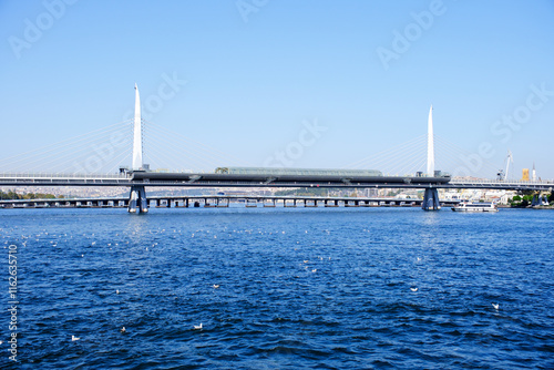 Golden Horn Metro Bridge above sea in İstanbul, Turkey photo