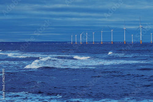 Offshore Wind Turbines and Ocean Waves in Redcar, UK.