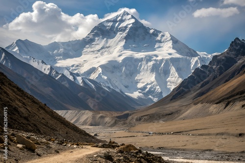 Mount Everest from the northern Tibetan side offers a majestic view with rugged, snow-capped peaks, steep slopes, and vast, barren landscapes, standing as Earth's highest point.