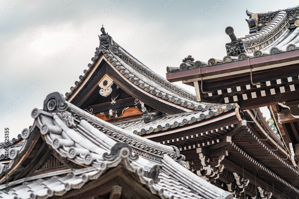 Detail of a traditional japanese rooftop. Buddhist temple architecture. Detail of a traditional japanese rooftop. Buddhist temple architecture.