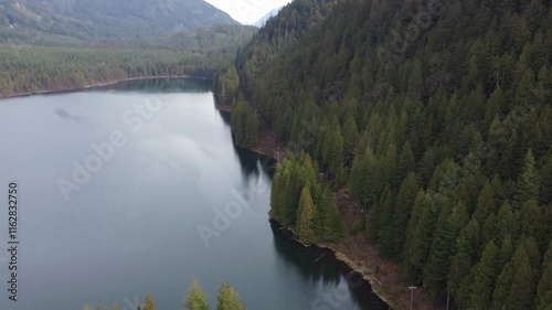 Wallpaper Mural Gliding over nature’s beauty: a calm lake and misty mountains Torontodigital.ca