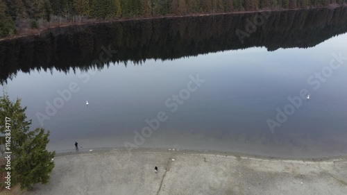 Wallpaper Mural Aerial views of a tranquil lake surrounded by nature on a cloudy afternoon Torontodigital.ca